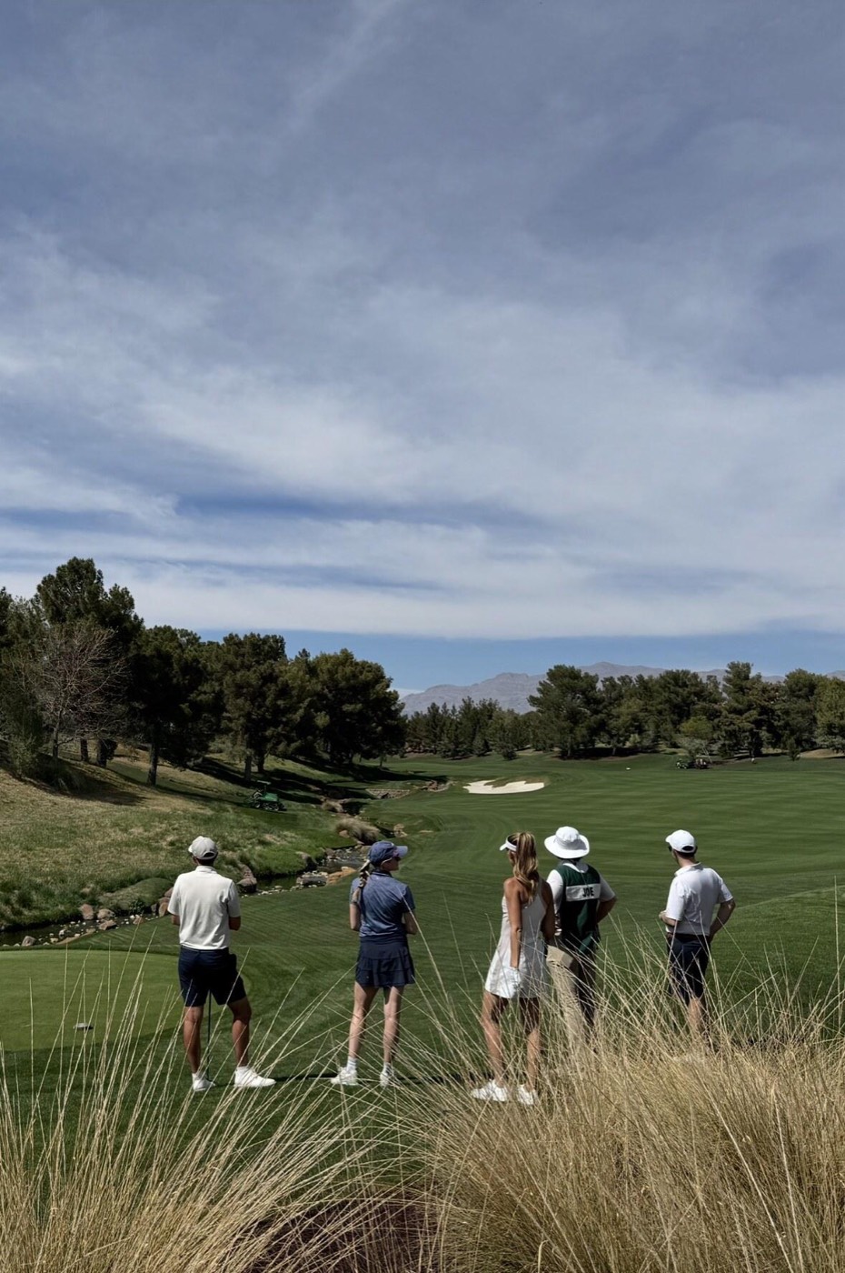 A group walking up the fairway at Shadow Creek